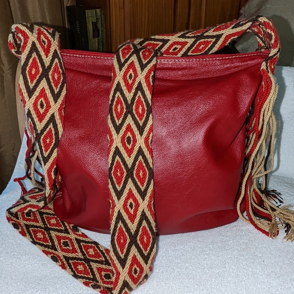 Bags & Boots red leather with Wayuu crossbody strap.